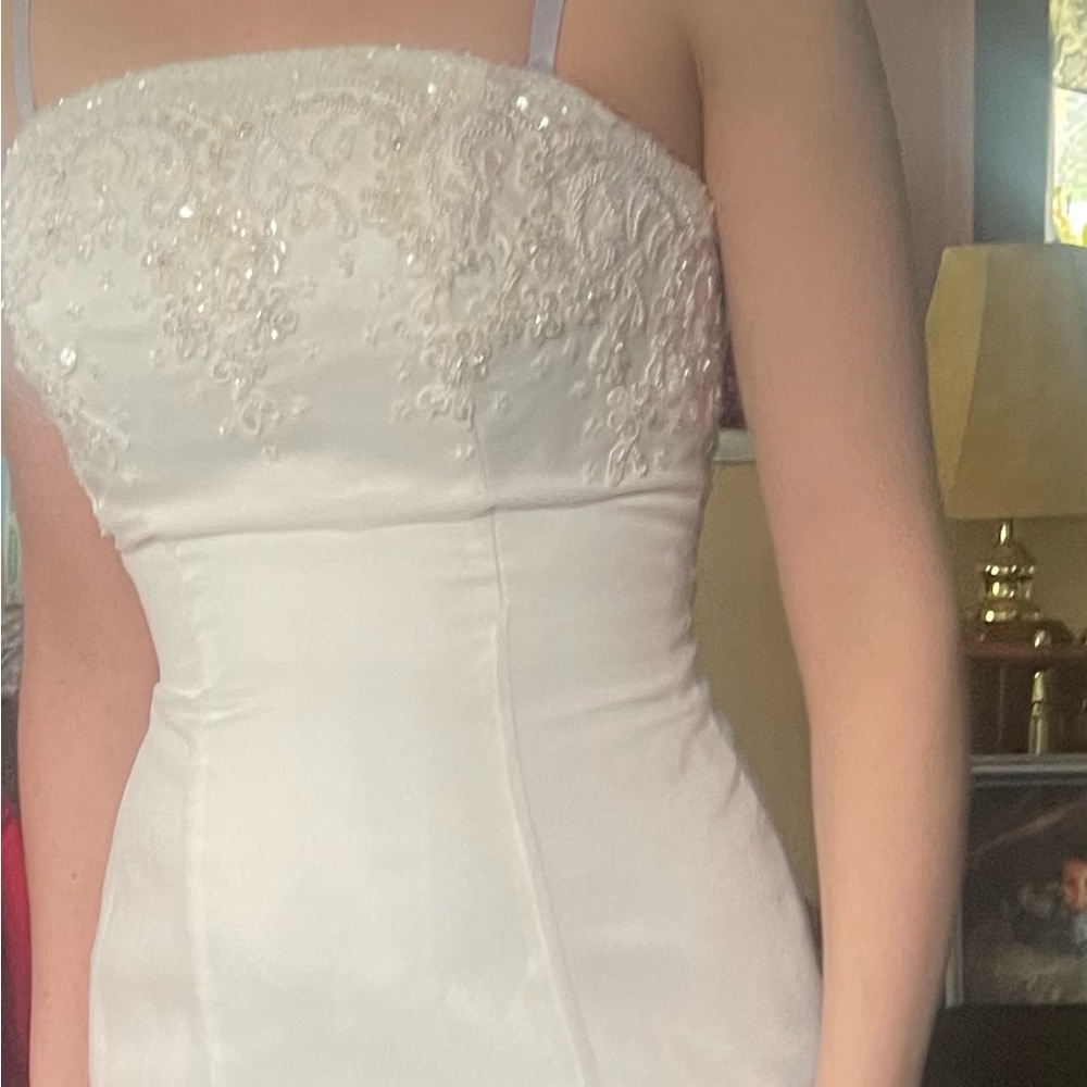 Wedding dress size 4 like new has vail with it from David’s BridalMichael Angelo